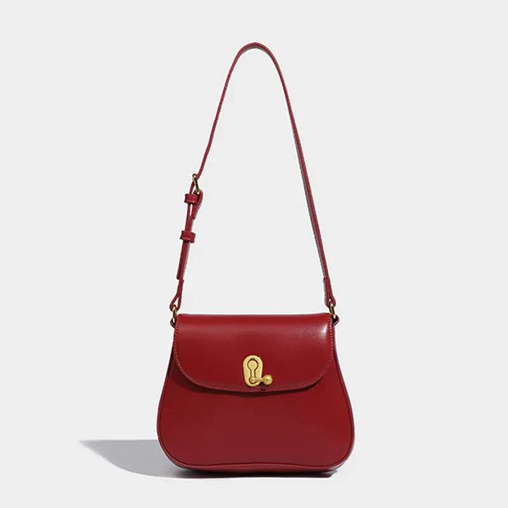 Sac élégant: sac bandoulière rouge en cuir synthétique avec détails dorés, pour femme