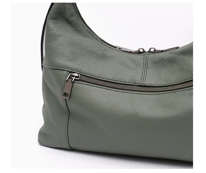 Sac bandoulière souple noir en cuir synthétique, polyvalent et confortable pour femme