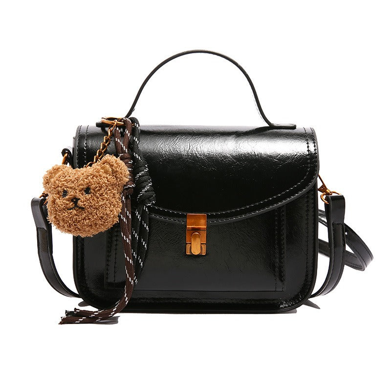 Sac à bandoulière femme structuré, cadeau idéal. Élégance du similicuir, charme et praticité au quotidien.