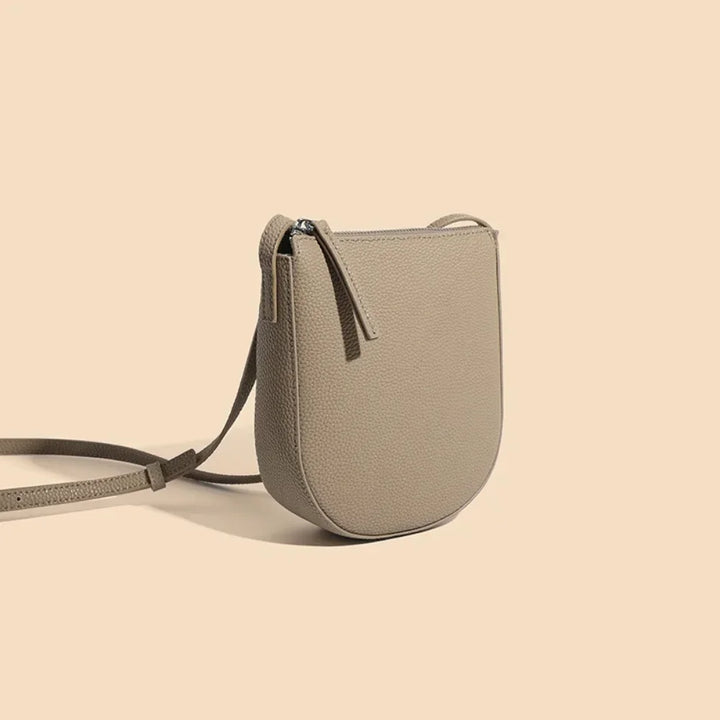 Sac bandoulière pratique pour téléphone et essentiels femme, cuir grainé, élégant.