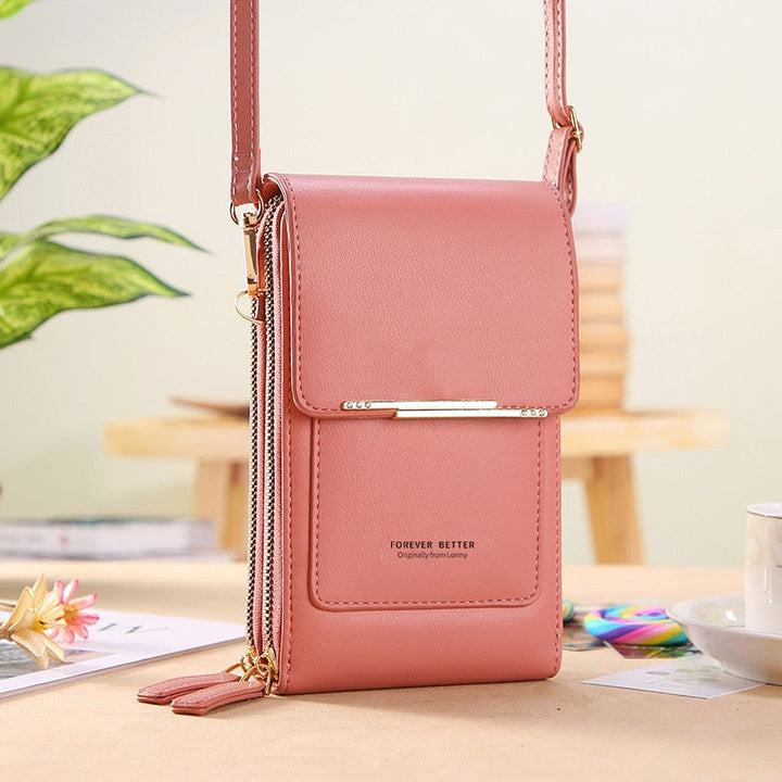 Sac bandoulière femme organiseur, en cuir vegan, très pratique pour un usage quotidien et les voyages.