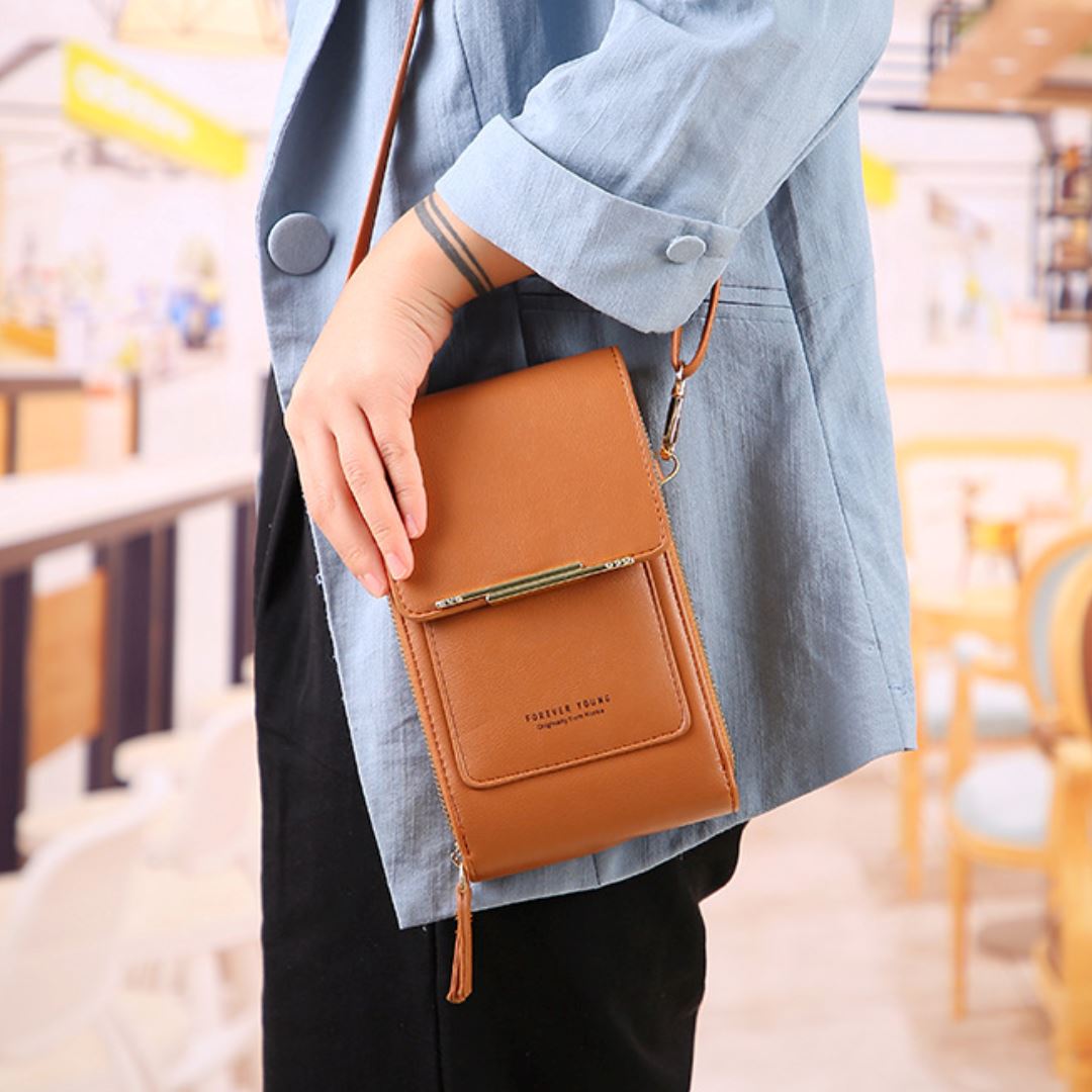 Sac bandoulière pratique pour téléphone portable, matière cuir vegan, alliant élégance et fonctionnalité.