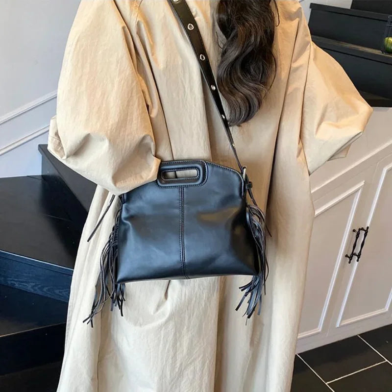 Sac femme chic et polyvalent, accessoire de mode parfait pour toutes occasions.