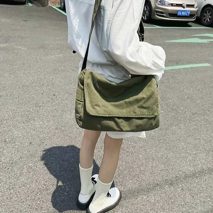 Sac bandoulière unisexe en toile écologique, style vintage et pratique pour le quotidien.