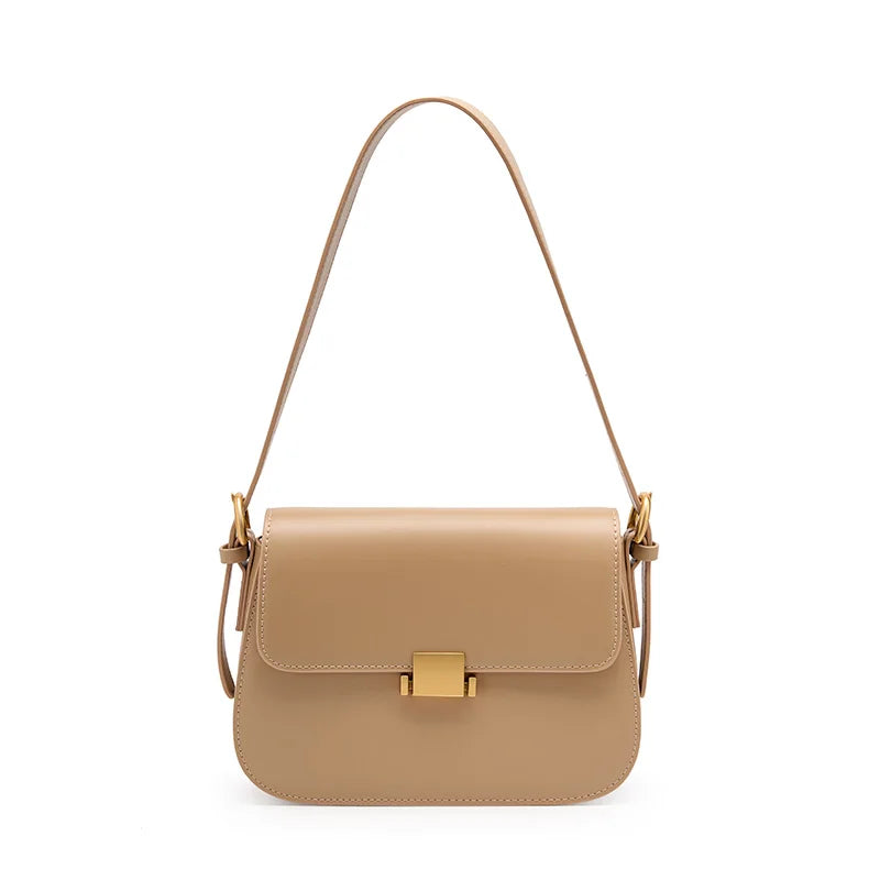 Sac à main bandoulière femme crème. Cuir vegan sophistiqué, accessoire de luxe élégant et pratique.