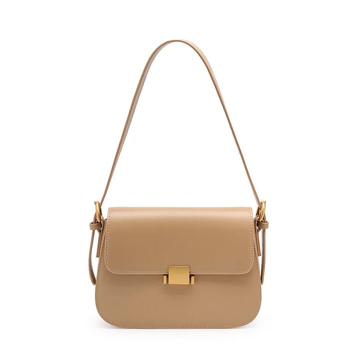 Sac à main bandoulière femme crème. Cuir vegan sophistiqué, accessoire de luxe élégant et pratique.