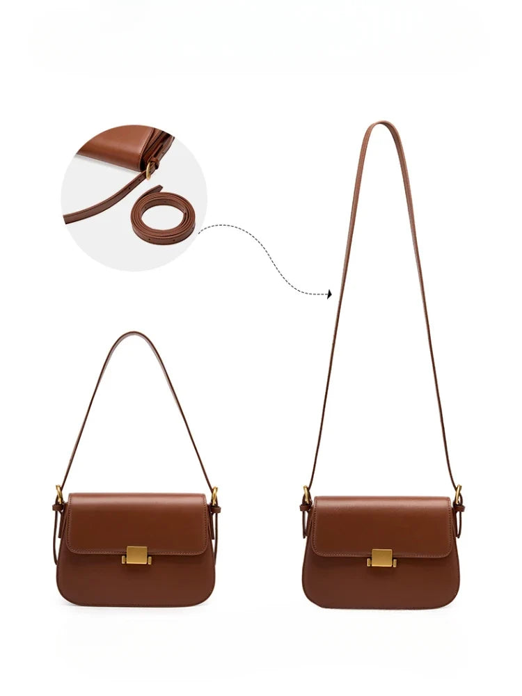 Sac bandoulière vegan noir porté par une femme. Accessoire de mode luxe, élégant et intemporel.