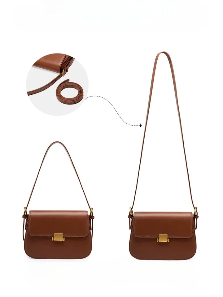 Sac bandoulière vegan noir porté par une femme. Accessoire de mode luxe, élégant et intemporel.