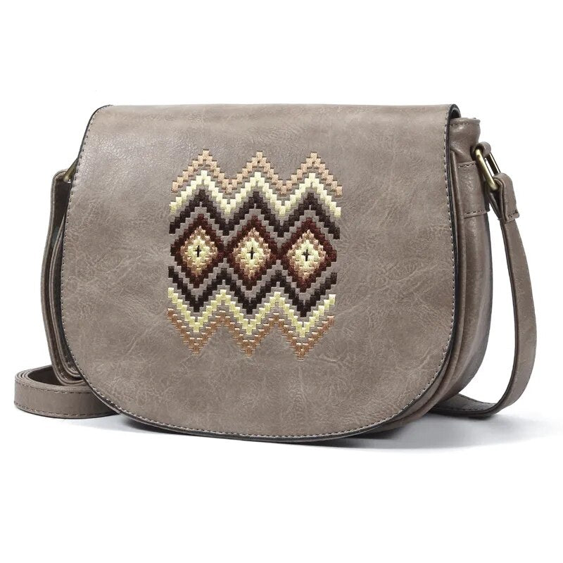 Sac vintage en cuir pour femme, style bandoulière, idéal pour un usage quotidien.