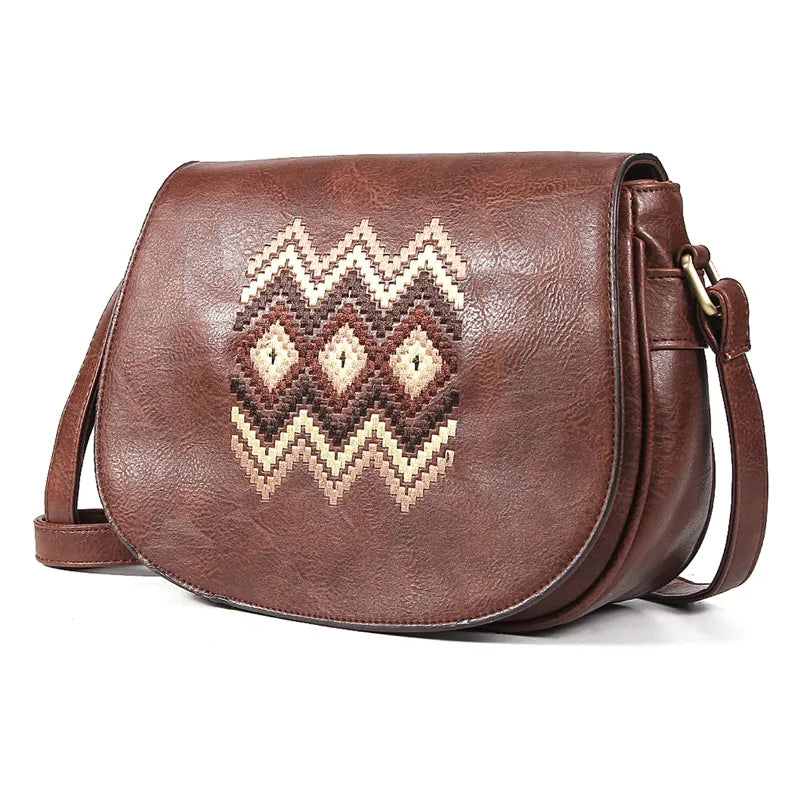 Sac à main vintage femme, bandoulière réglable en cuir, couleur classique.
