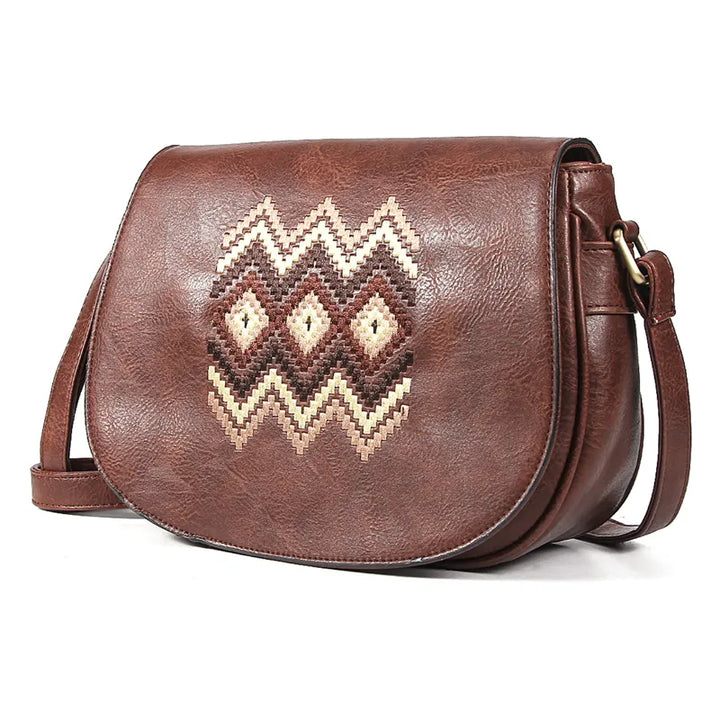 Sac à main vintage femme, bandoulière réglable en cuir, couleur classique.