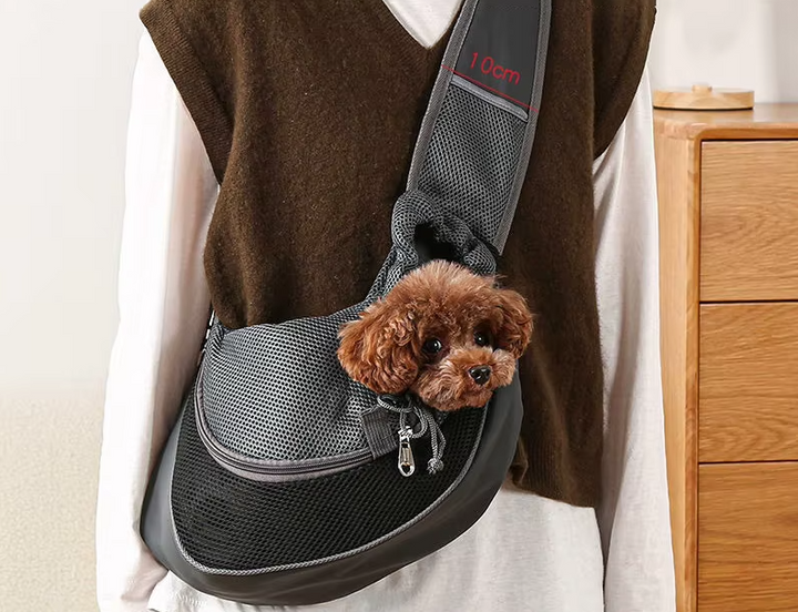 Sac bandoulière chien, transport animal confortable et respirant.  Design ergonomique, sécurité optimale.