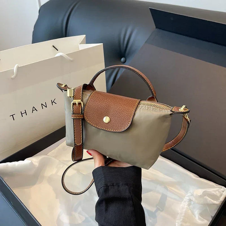Sac bandoulière femme, élégant et compact.  Idéal automne.  Chic minimaliste.