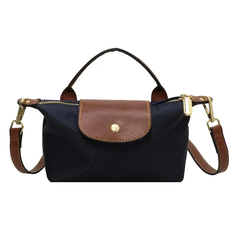 Sac bandoulière femme, élégant et compact.  Idéal automne.  Chic minimaliste.
