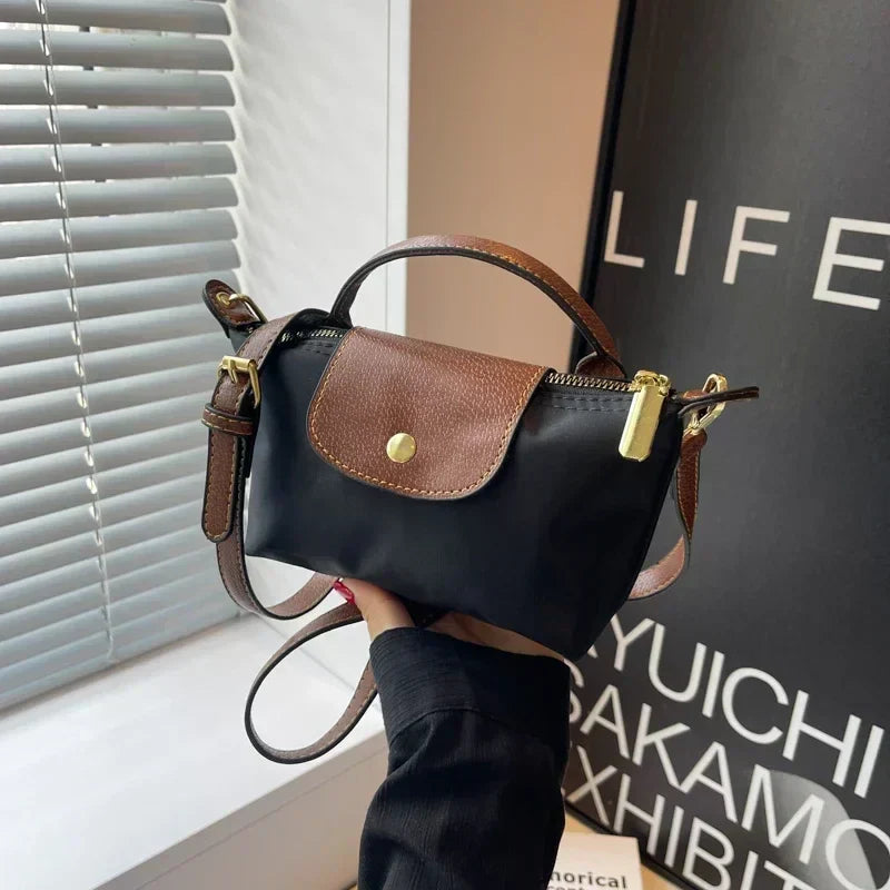 Sac bandoulière femme, élégant et compact.  Idéal automne.  Chic minimaliste.