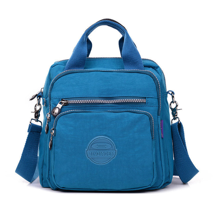 "Sac bandoulière femme imperméable 3-en-1, élégant, couleurs variées, design polyvalent, poches zippées, style chic."