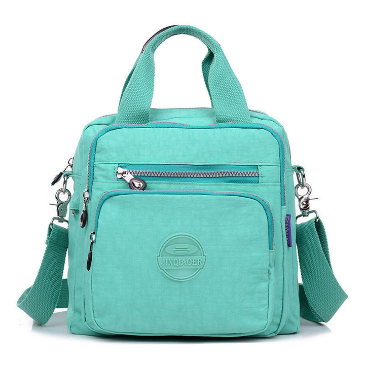 "Sac bandoulière femme imperméable 3-en-1, élégant, couleurs variées, design polyvalent, poches zippées, style chic."