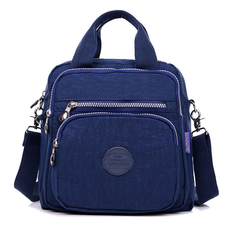 "Sac bandoulière femme imperméable 3-en-1, élégant, couleurs variées, design polyvalent, poches zippées, style chic."