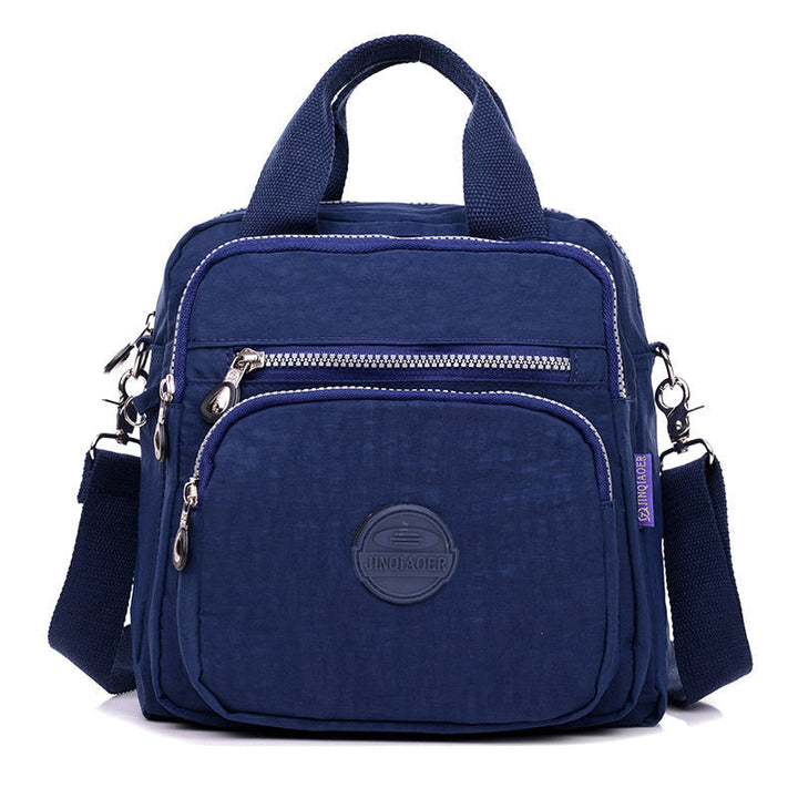 "Sac bandoulière femme imperméable 3-en-1, élégant, couleurs variées, design polyvalent, poches zippées, style chic."