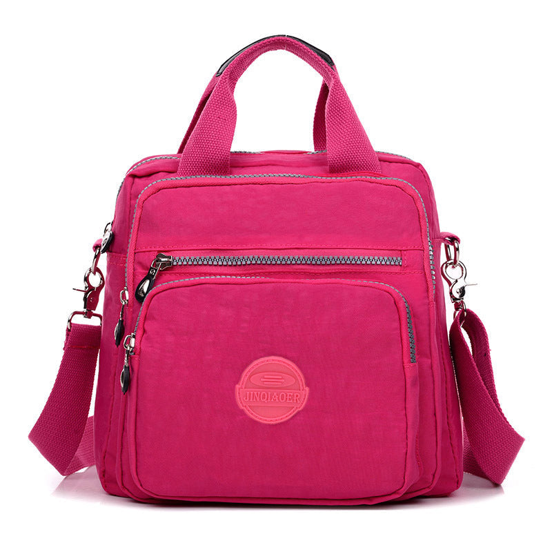"Sac bandoulière femme imperméable 3-en-1, élégant, couleurs variées, design polyvalent, poches zippées, style chic."