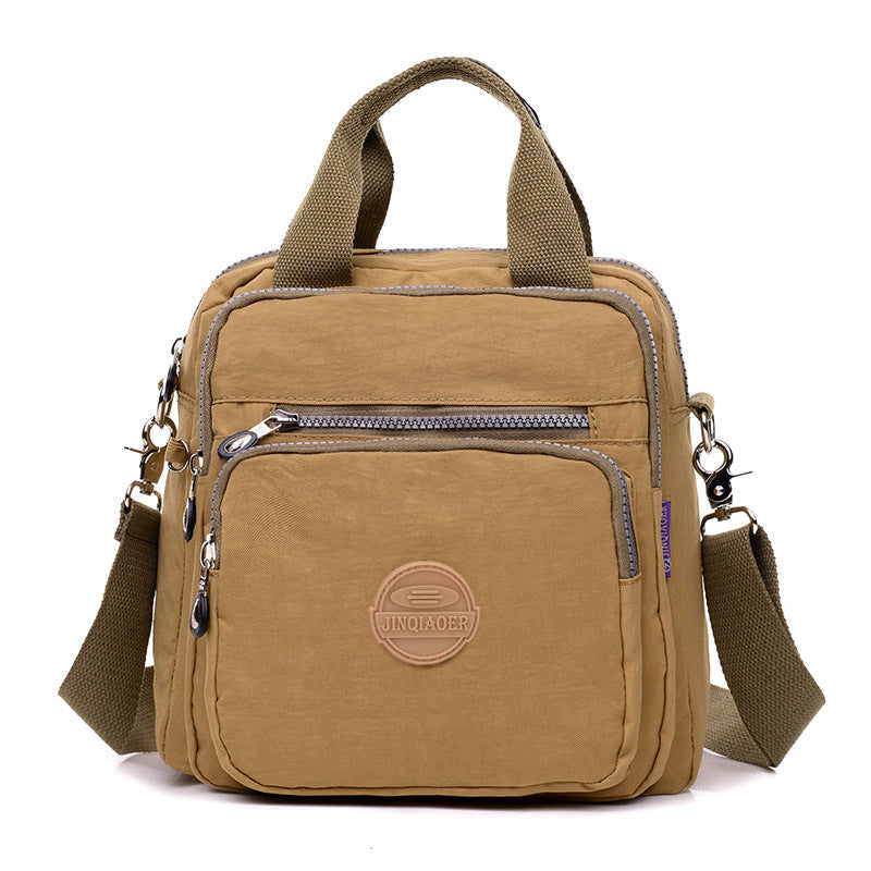 "Sac bandoulière femme imperméable 3-en-1, élégant, couleurs variées, design polyvalent, poches zippées, style chic."
