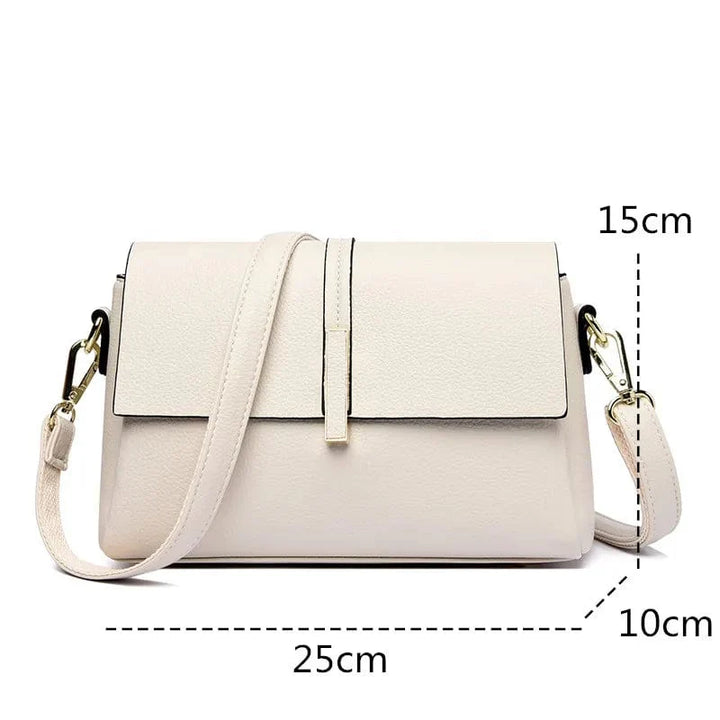 Sac femme Alice en cuir PU rose poudré, un sac bandoulière élégant et discret.