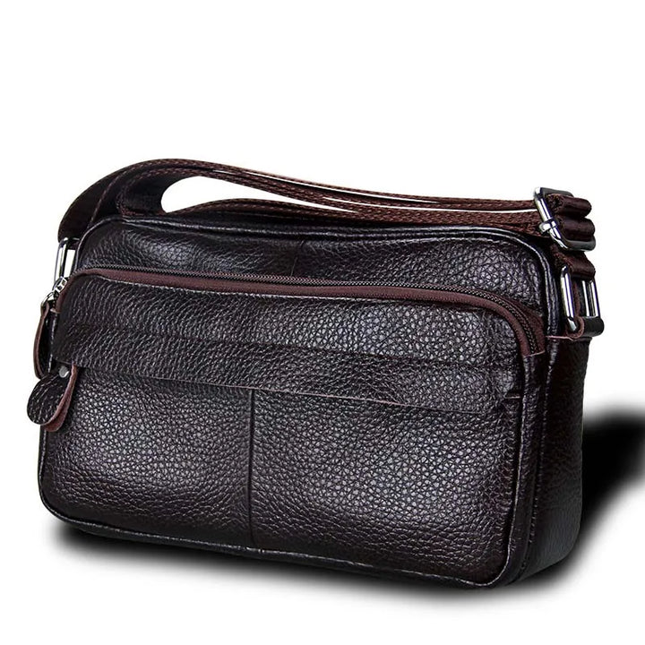 Accessoire femme : sac à main besace camel chic en cuir synthétique, idéal pour un look organisé et quotidien.