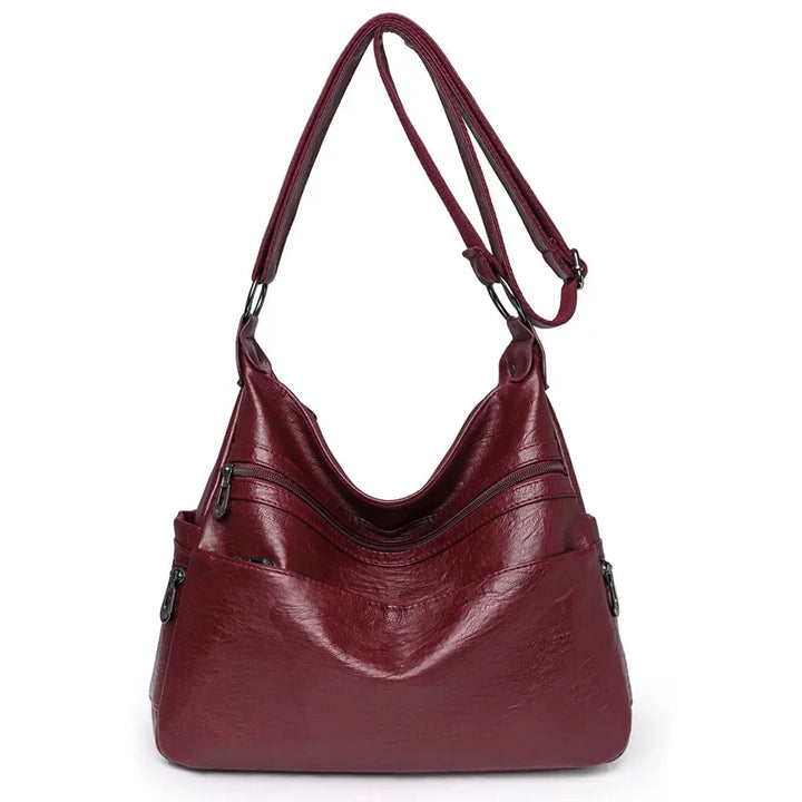 Sac besace femme élégant en similicuir souple, idéal pour un usage quotidien.