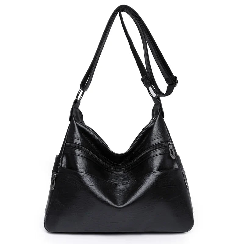 Sac besace femme chic en similicuir avec bandoulière réglable, accessoire mode indispensable.