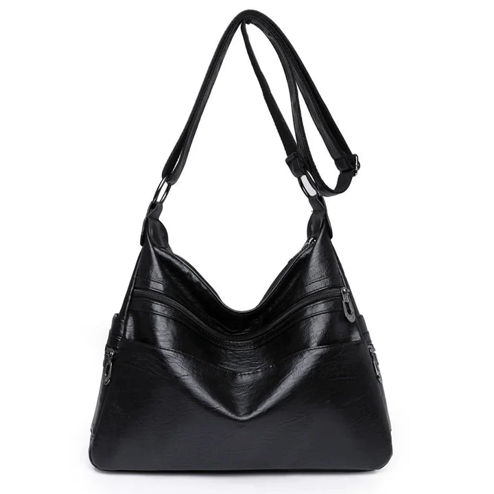 Sac besace femme chic en similicuir avec bandoulière réglable, accessoire mode indispensable.
