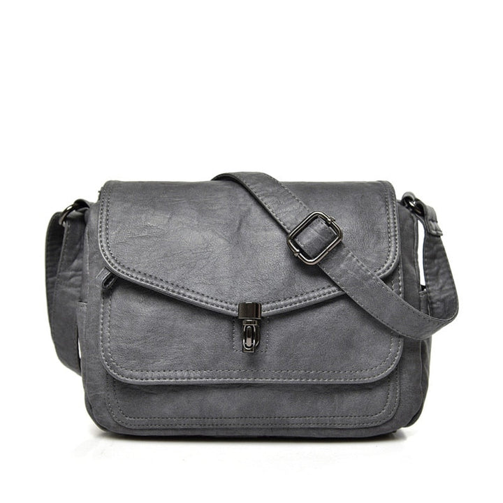 Sac besace femme en cuir PU, parfait pour organiser vos affaires essentielles avec style.