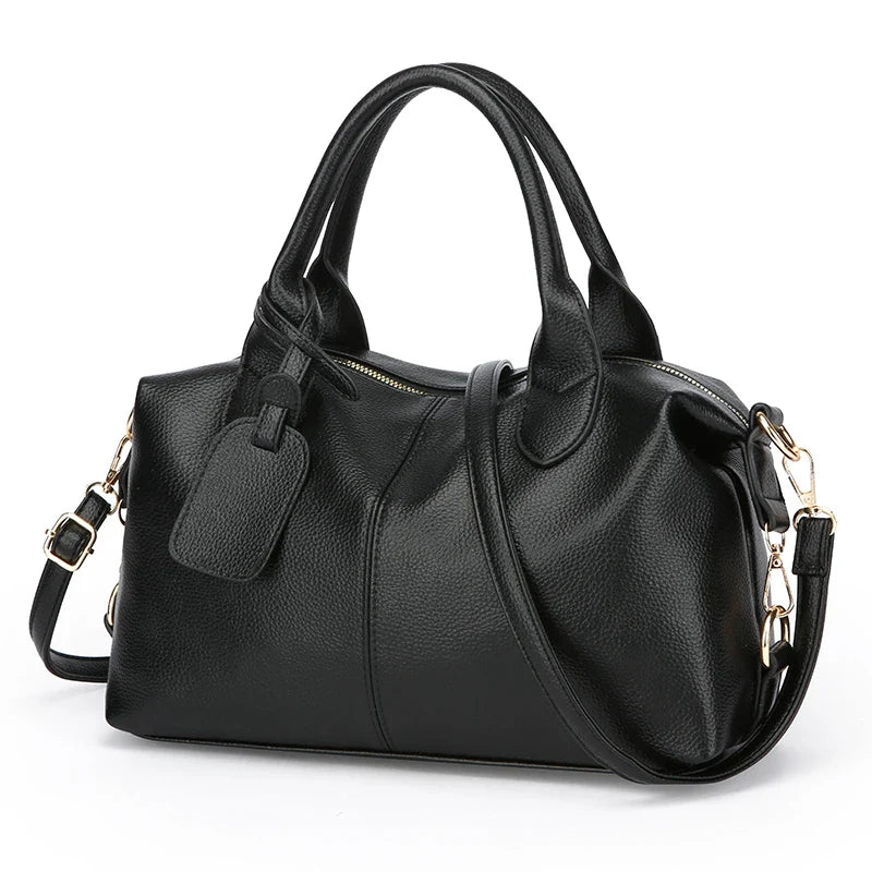 Élégant sac à main bowling noir pour femmes, design chic et spacieux en similicuir de haute qualité.