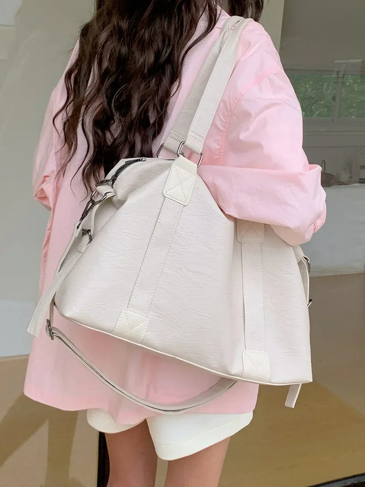 Sac cabas femme polyvalent noir, porté épaule ou travers, design élégant et grand espace, mode femme.