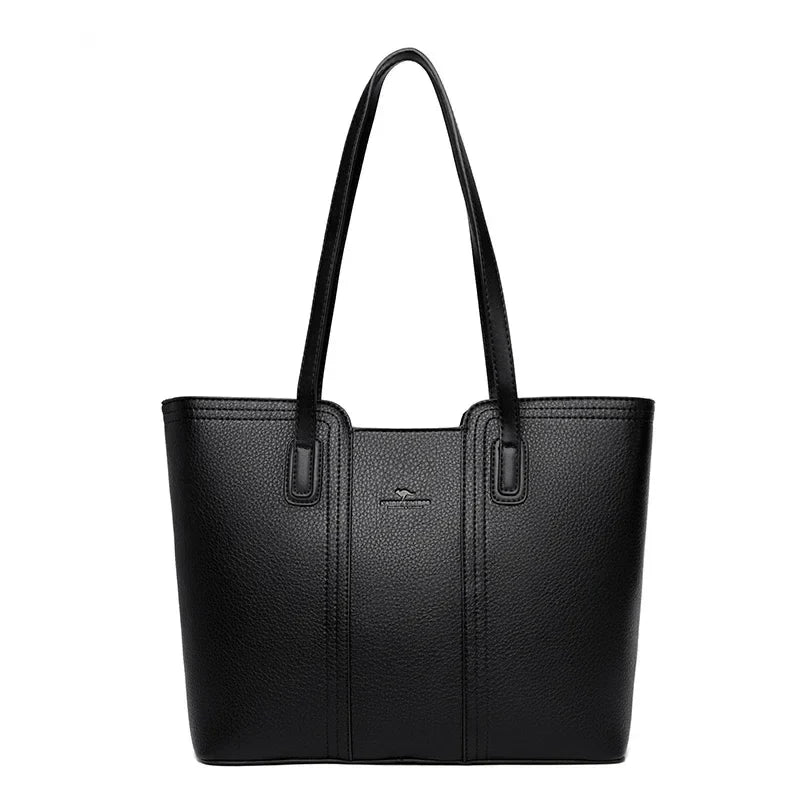 Sac cabas chic en similicuir pour femme avec fermeture éclair, idéal pour un usage quotidien.