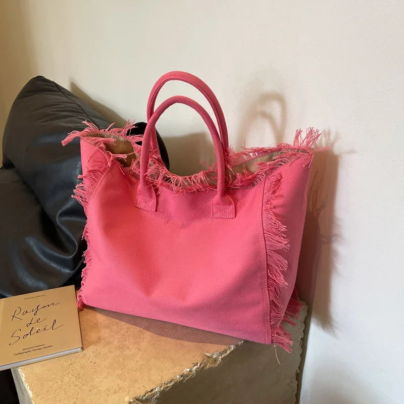 Sac cabas de plage élégant en toile pour femme, grand et chic, parfait pour l'été et les accessoires de plage.