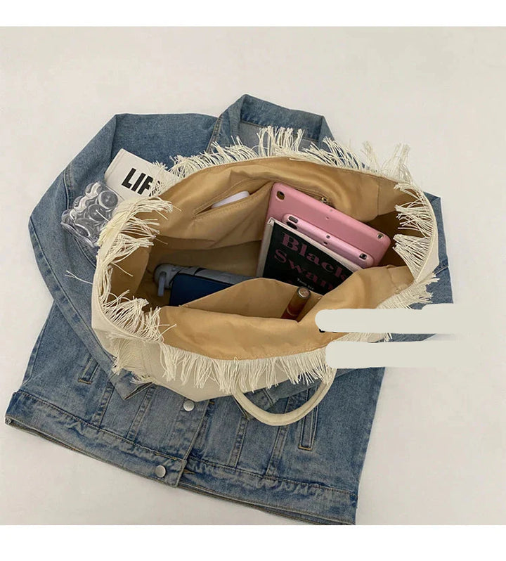 Sac de plage femme, grand fourre-tout cabas à porter à l'épaule. Accessoire d'été polyvalent et tendance.