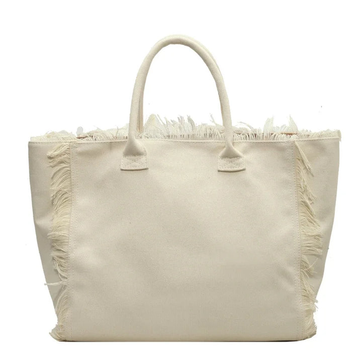 Grand sac cabas de plage polyvalent pour femme. Ce fourre-tout en toile est parfait pour l'été et le voyage.