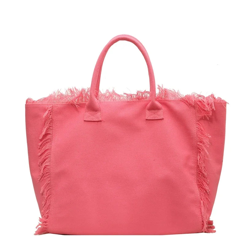 Sac de plage femme chic, grand cabas en toile. Idéal comme fourre-tout d'été pour transporter tous vos essentiels.