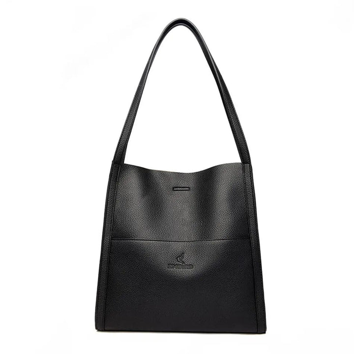 Sac cabas Gabriela en cuir posé, prêt à être porté, reflétant son style chic et polyvalent.