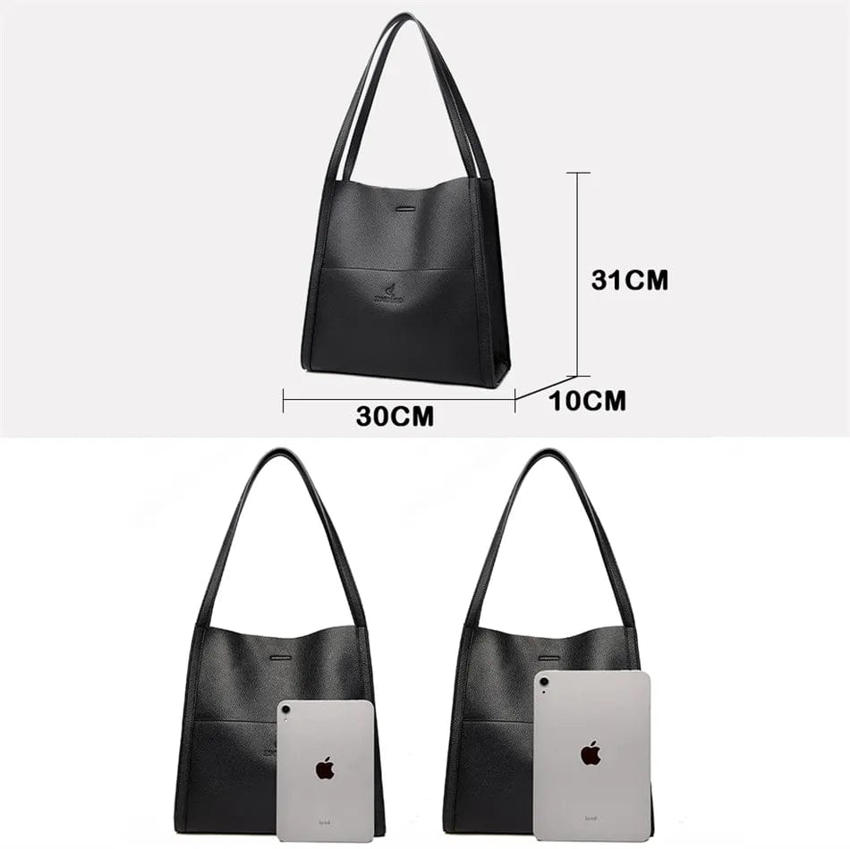 Détail de la poignée du sac cabas Gabriela en cuir, robuste et confortable pour le port quotidien.