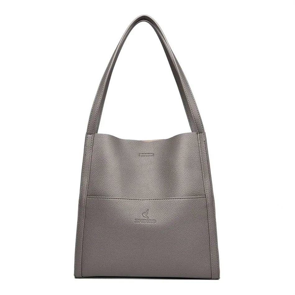 Vue latérale du sac à main femme Gabriela, soulignant son design structuré et tendance.