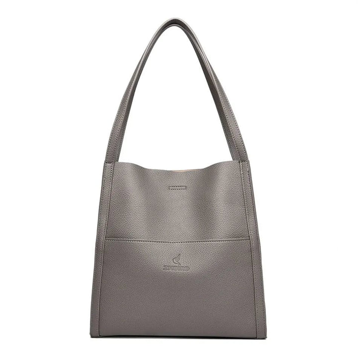 Vue latérale du sac à main femme Gabriela, soulignant son design structuré et tendance.