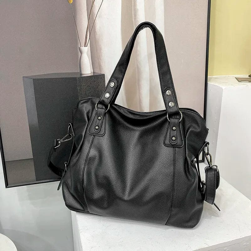 "Sac cabas en cuir PU souple noir, élégant et spacieux, avec fermeture zippée et bandoulière pour un style pratique."