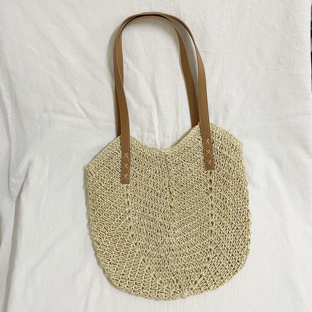 Sac femme en paille tressée, style bohème chic. Sac d'été léger et élégant, parfait pour la plage ou comme cabas.