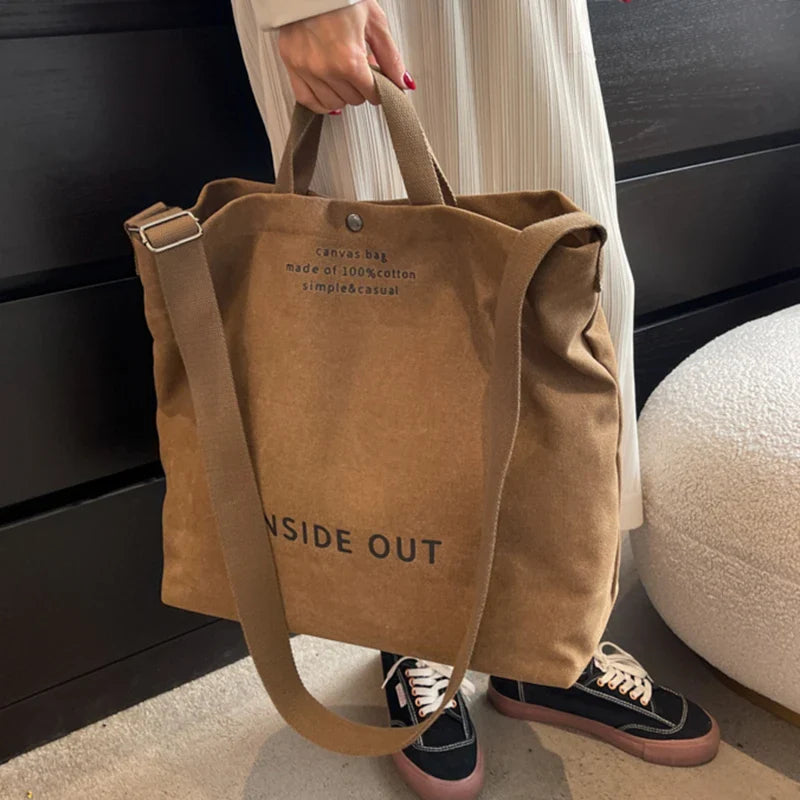 Sac cabas en toile de coton beige, grand format, style fourre-tout, idéal pour le quotidien.