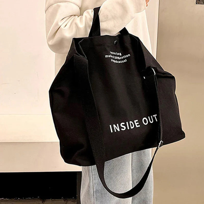 Sac cabas en toile marron avec poignées et bandoulière, idéal pour le quotidien et transporter vos affaires.