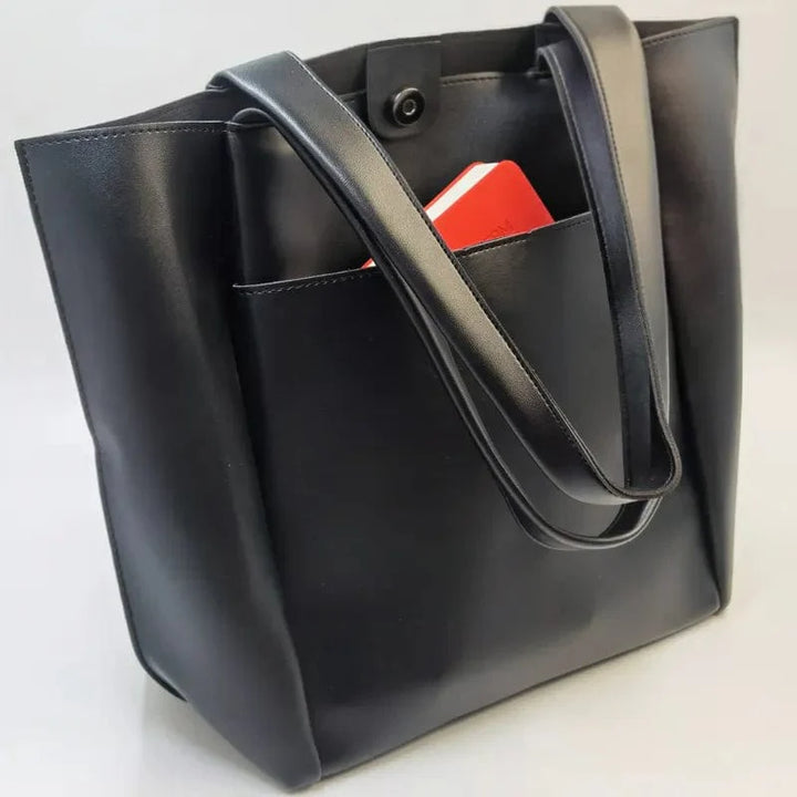 Sac cabas femme Ariel en cuir PU noir élégant, avec bandoulière, idéal travail et quotidien.