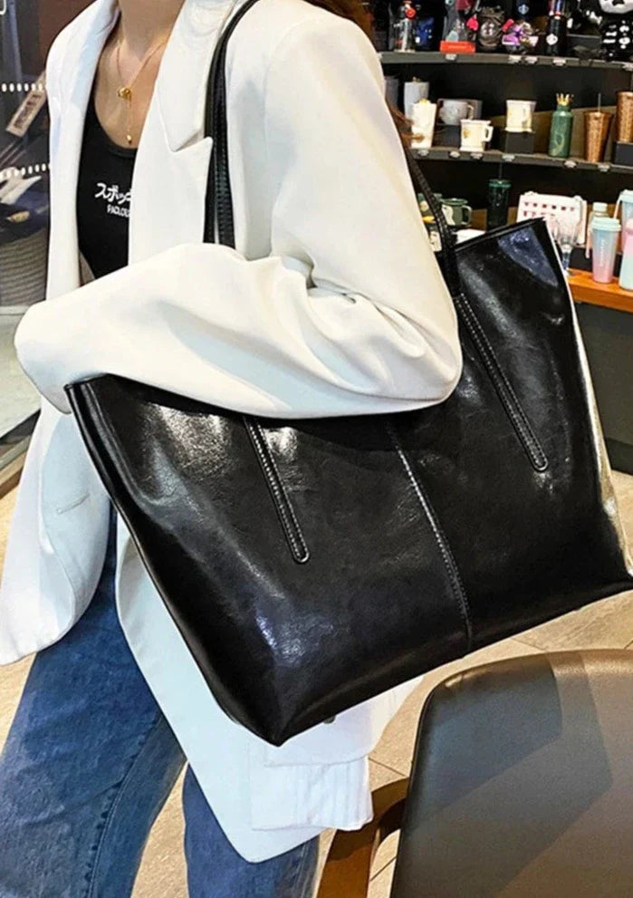 Grand sac cabas femme en cuir marron, professionnel, avec anses, pour transport PC portable.