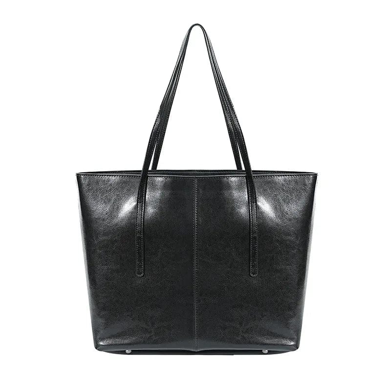 Sac cabas femme professionnel en cuir, bandoulière amovible, idéal pour le bureau et ordinateur.