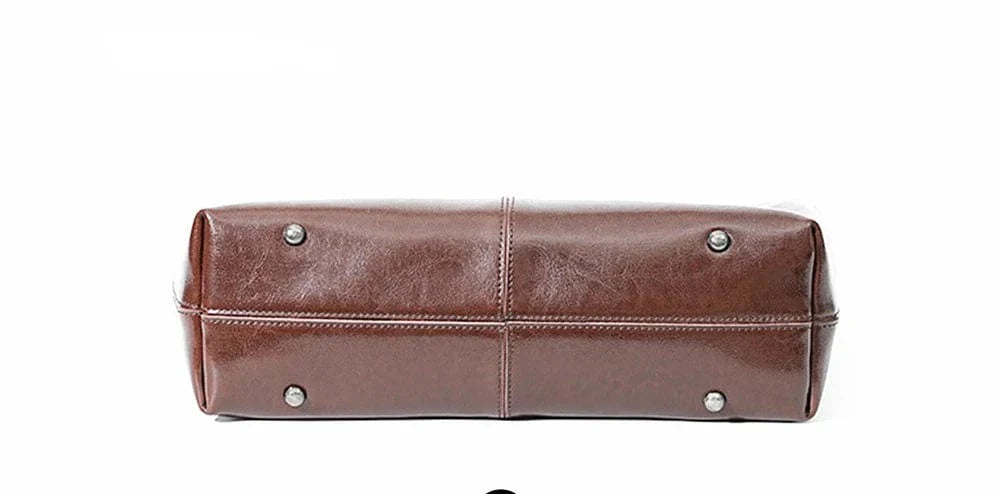 Sac à main cabas en cuir véritable pour femme, couleur bordeaux, design moderne pour ordinateur.